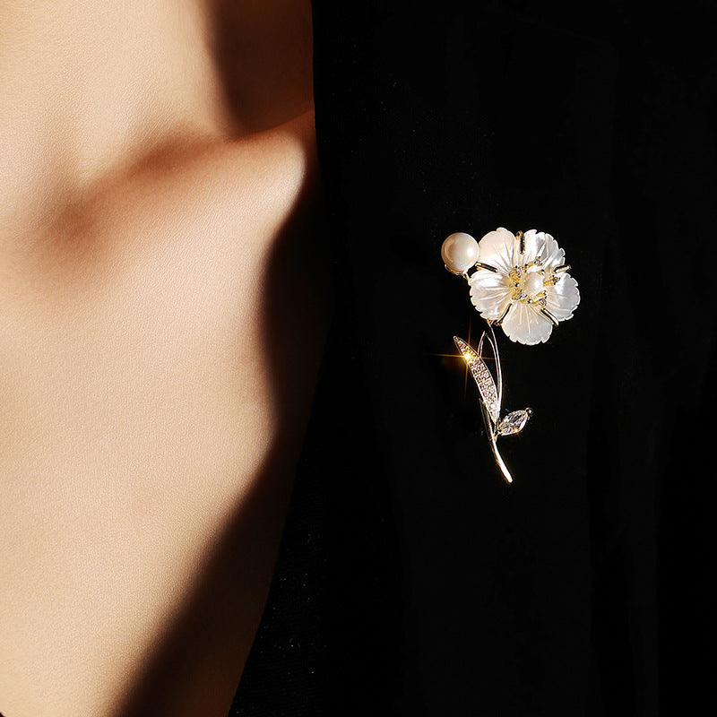Floral brooch on a dark background
